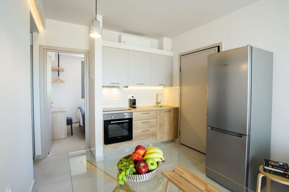 Superior Apartment, 2 Bedrooms, Sea View | Private kitchen | Full-size fridge, coffee/tea maker, electric kettle, toaster