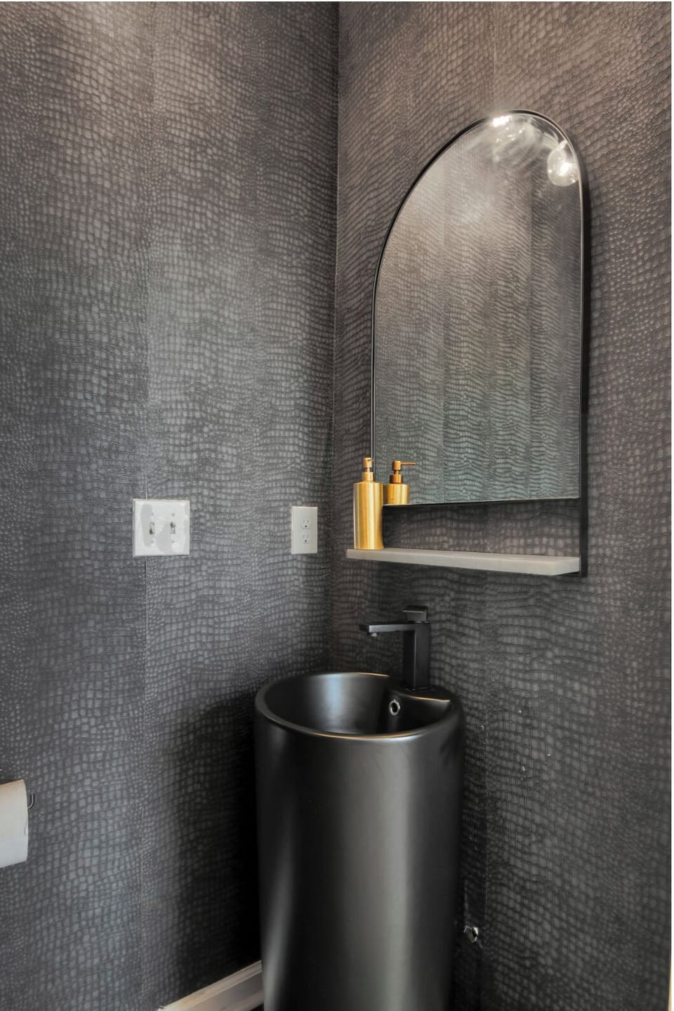 Downstairs powder bathroom with toilet and sink only