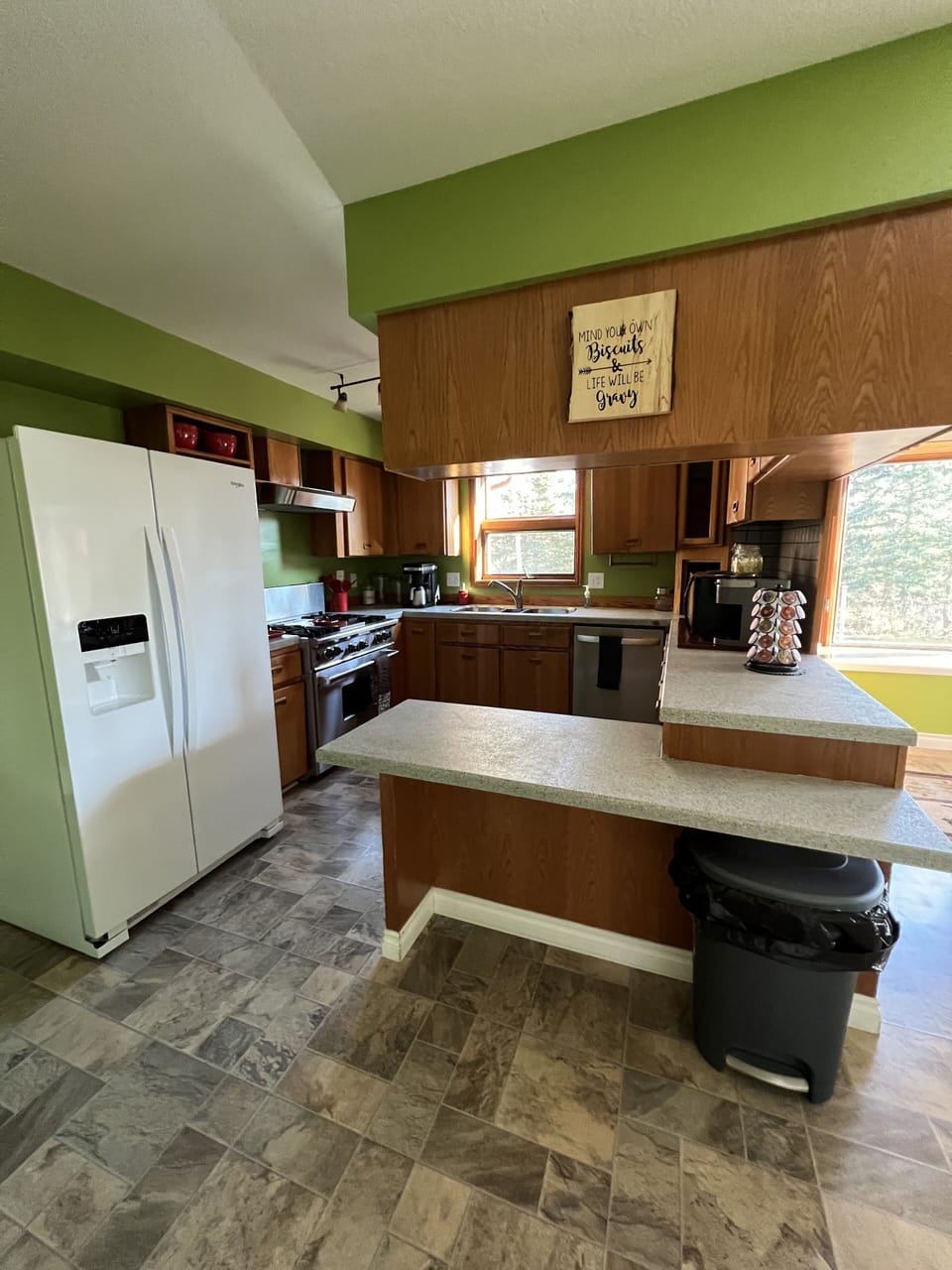 A large refrigerator/freezer and a large Wolfe gas stove add to the benefits.