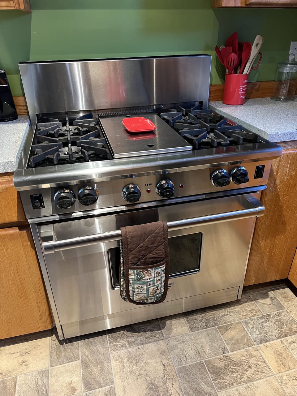 This Wolfe gas stove can warm pizzas or be a part of a full dinner.
