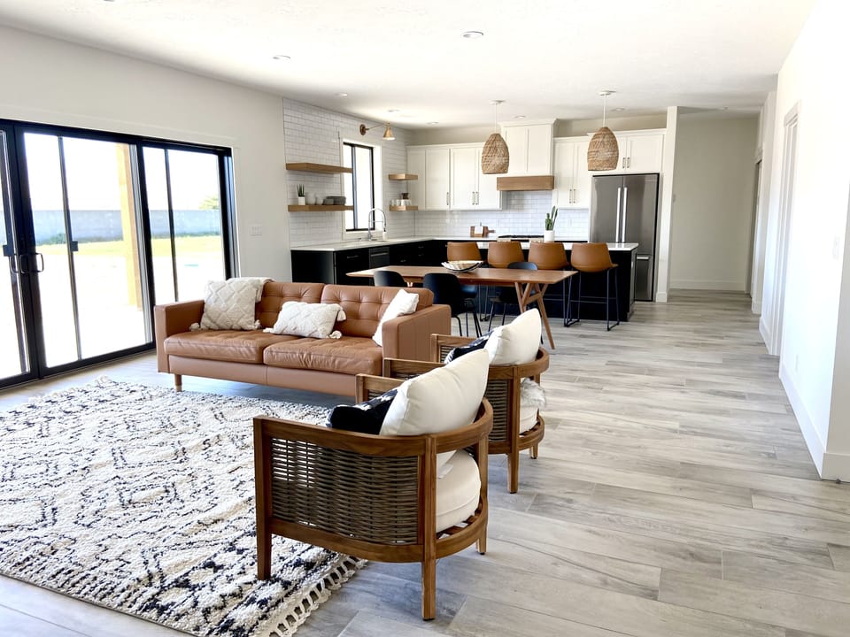 View of living room and kitchen from the hall to bedrooms 2 and 3.