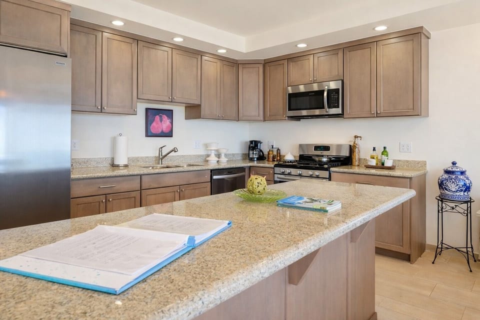 kitchen area with ample granite countertop space for just about anything