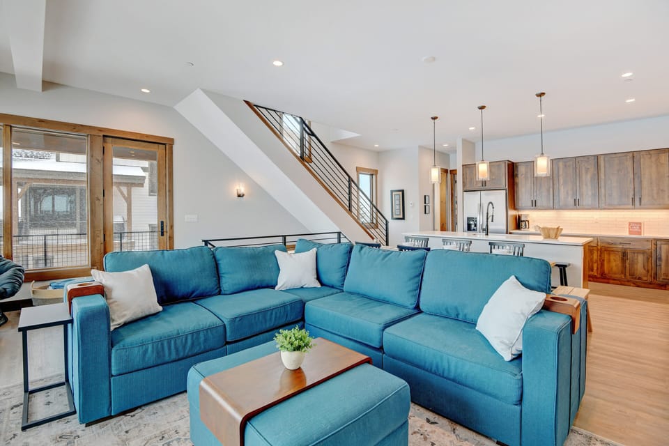 Beautiful High End Turquoise Sectional With Plenty Of Space For A Family Movie Night!