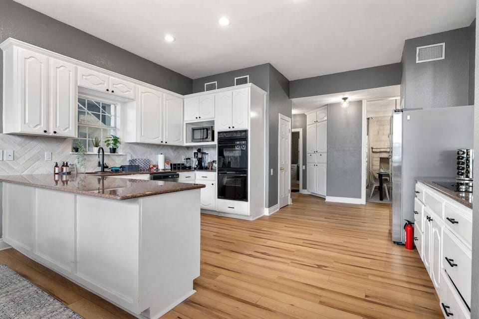 The kitchen is equipped with everything you need to make that gourmet meal. Start your morning off right at the coffee station, which includes a French press & Ninja Dual brew (12 cup drip coffee + K-cups), sure to impress even the toughest coffee critics