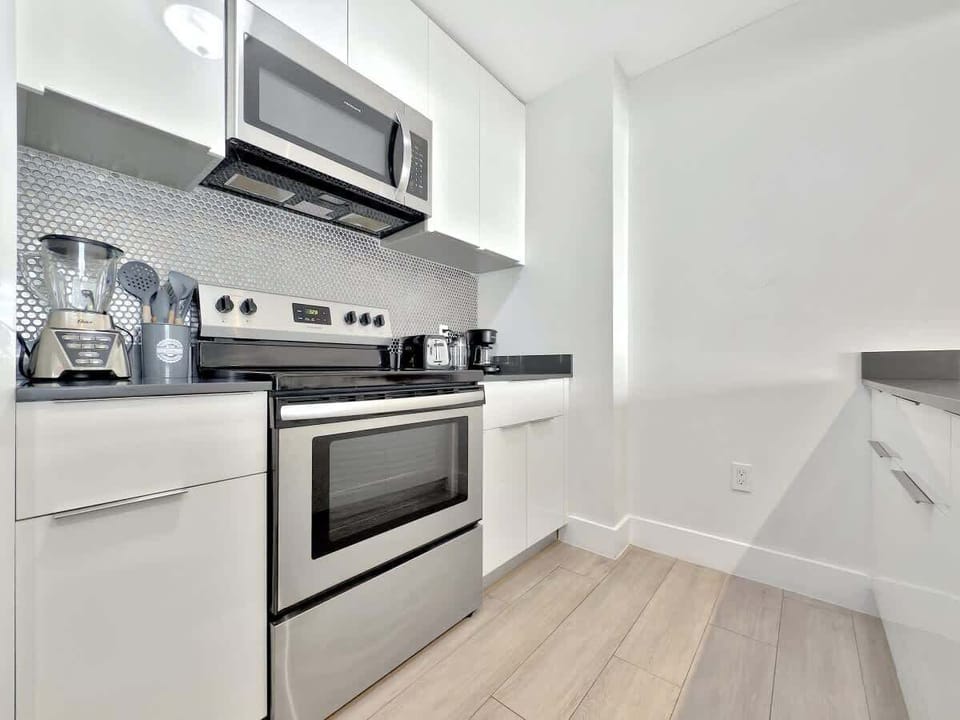 Fully equipped kitchen with complete set of cookware