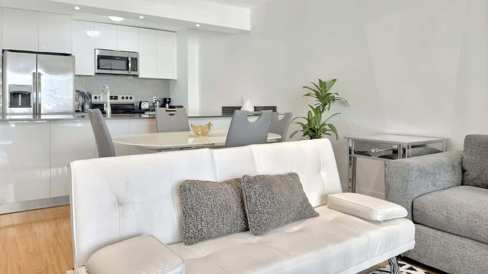 Modern open concept living space featuring dining area
