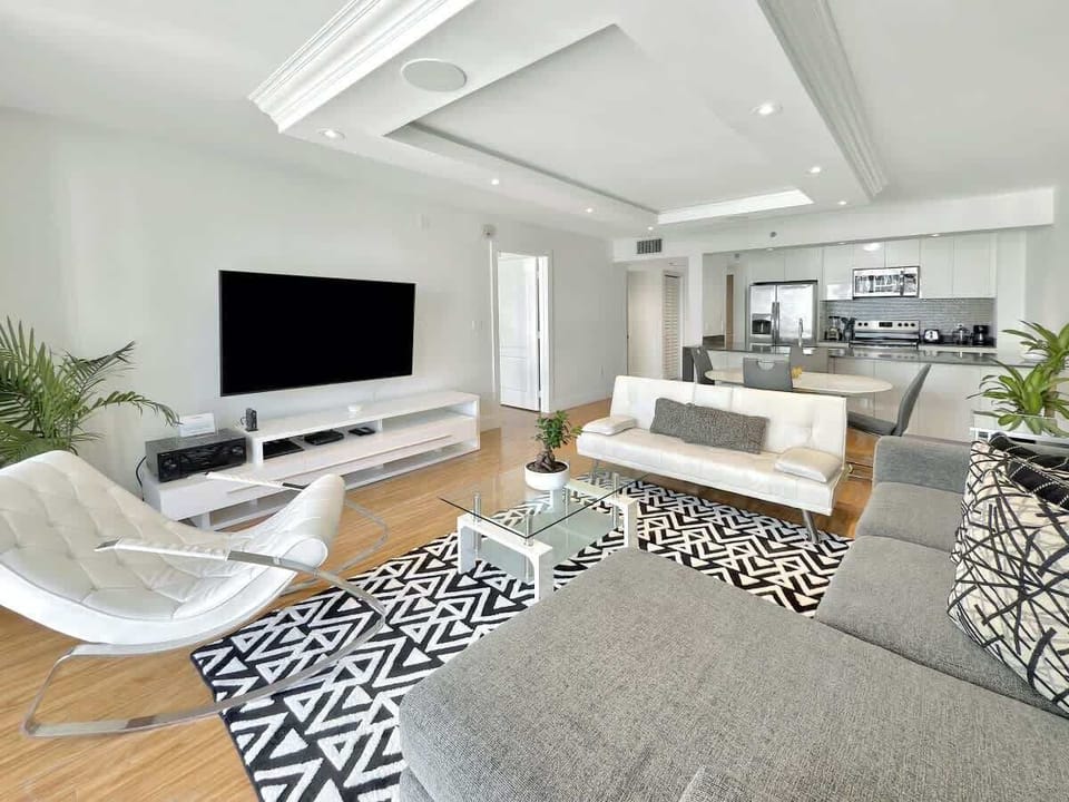 Modern open concept living space featuring dining area