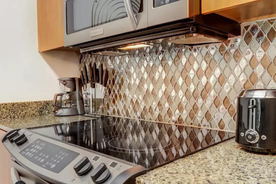 Fully equipped kitchen with complete set of cookware