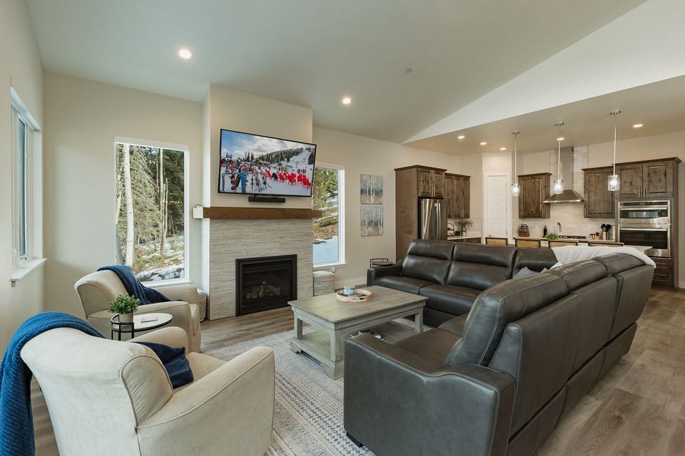 Main Living Space and Kitchen - TV, Gas Fireplace, Main Deck access and views