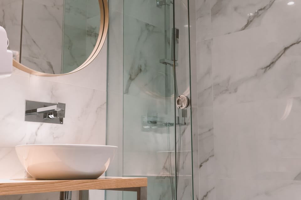 Bathroom | Shower, free toiletries, hair dryer, towels