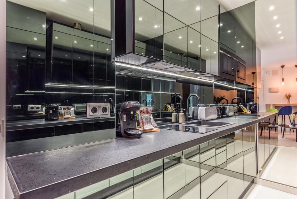 Main view of the kitchen space with appliances