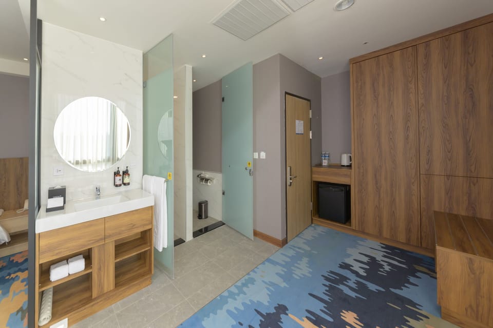 Design Double Room | Bathroom | Hair dryer, slippers, towels, soap