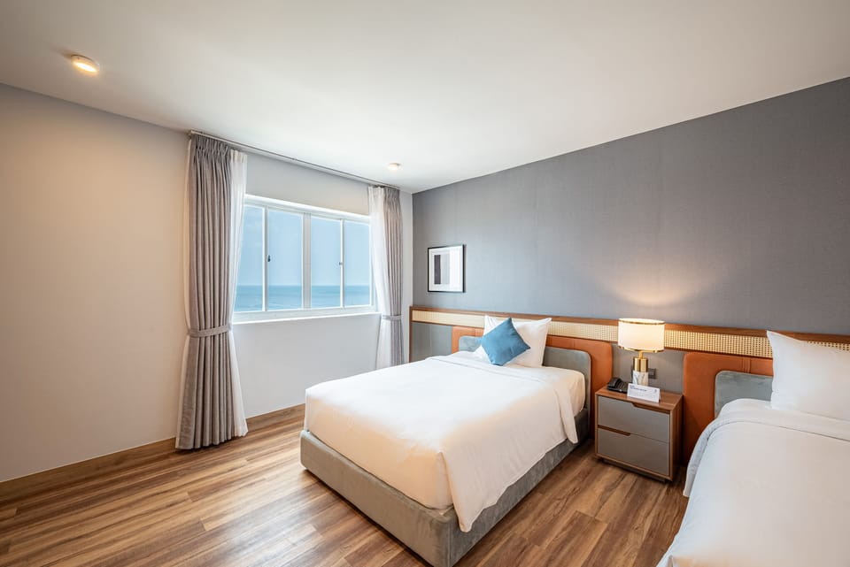 Premium Triple Room | Premium bedding, minibar, desk, laptop workspace