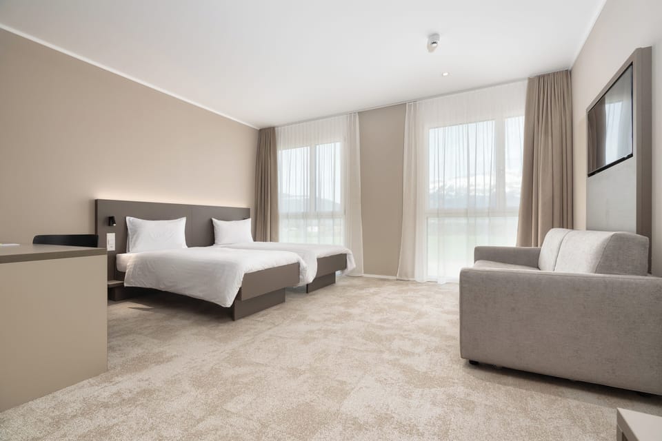 Junior Suite | Hypo-allergenic bedding, in-room safe, desk, blackout drapes