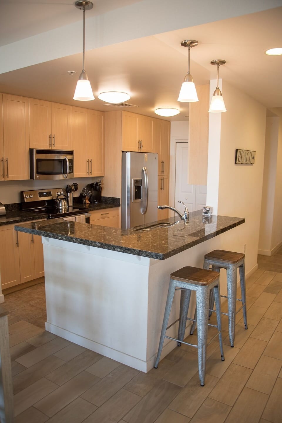 The kitchen is open to the dining and main living area.