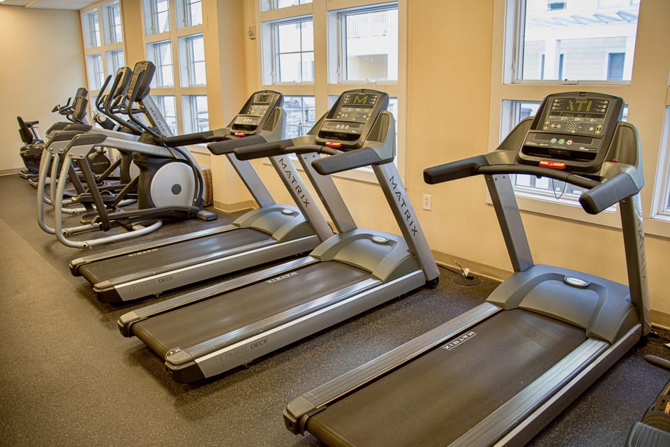 Two fully equipped onsite gyms, one in each building. 