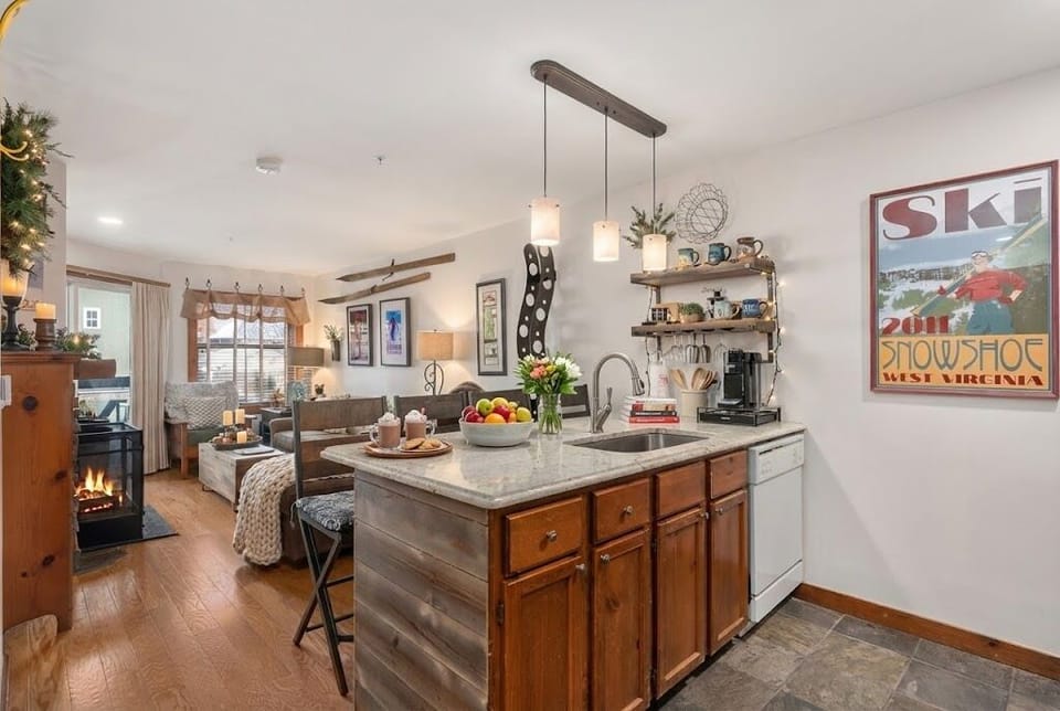 Cook and dine in style under the beautiful lighting in this fully equipped kitchen.