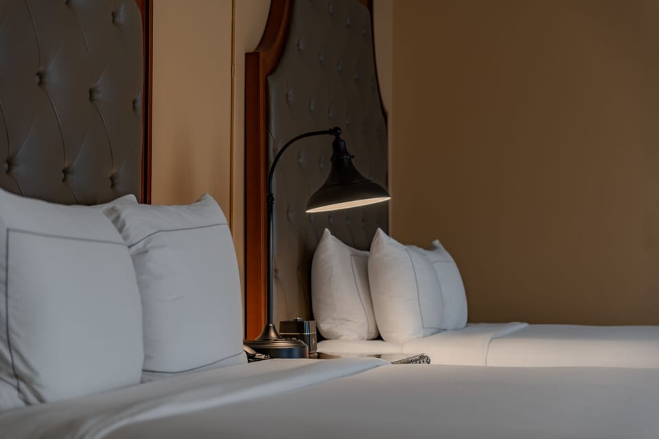 Room, 2 Queen Beds | Premium bedding, down comforters, in-room safe, individually decorated