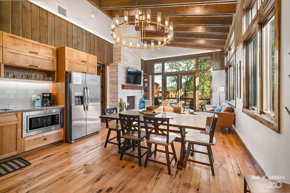 The living room offers tons of natural light and double doors to patio.