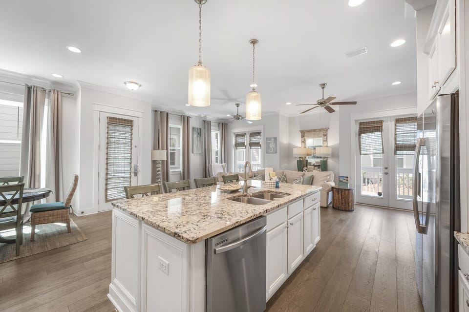 Dual sinks, dish washer and full sized french door fridge for your benefit. 