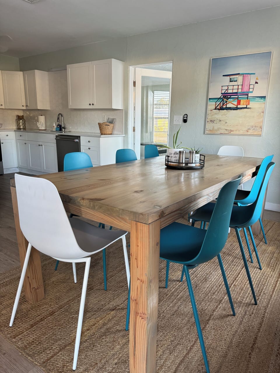 Bright natural light floods kitchen.