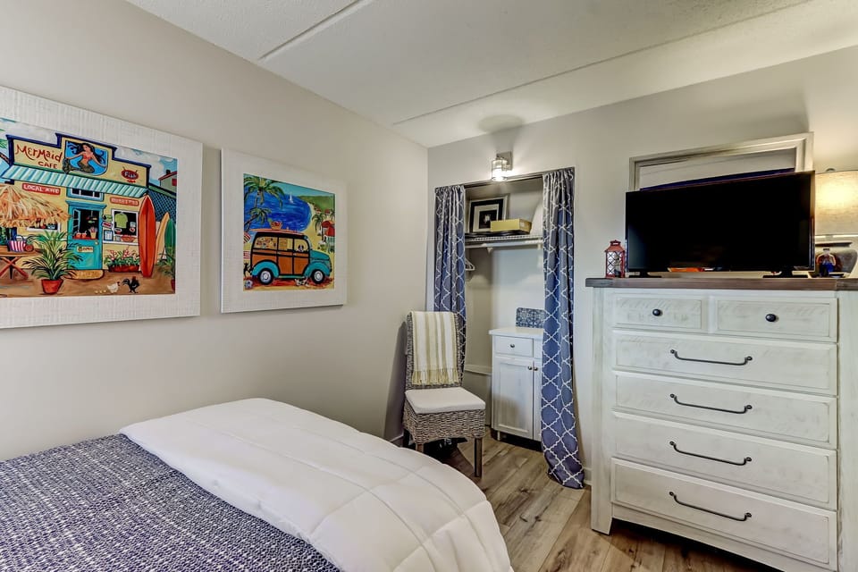 Guest Room with TV, Dresser and Closet