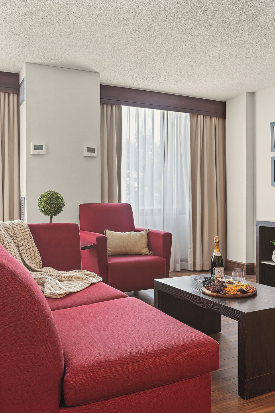 Junior Room, 2 Double Beds | Living area | 42-inch LCD TV with satellite channels, TV