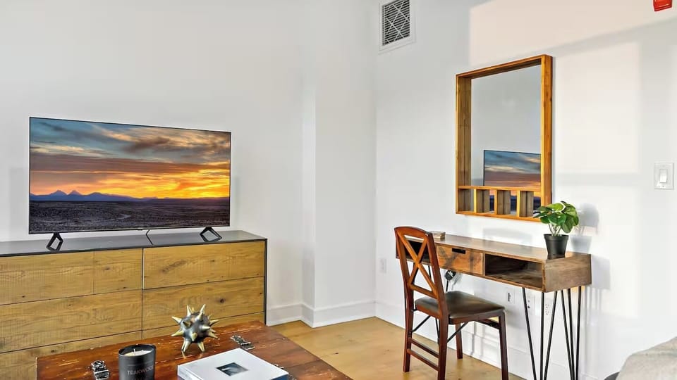 Grand Apartment, 1 Queen Bed, Refrigerator & Microwave, City View | Living area | 65-inch TV with digital channels, Netflix, Hulu