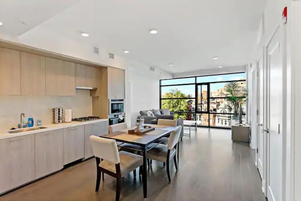 Exclusive Apartment, 2 Bedrooms, 2 Bathrooms | Living area | 65-inch TV with digital channels, Netflix, Hulu