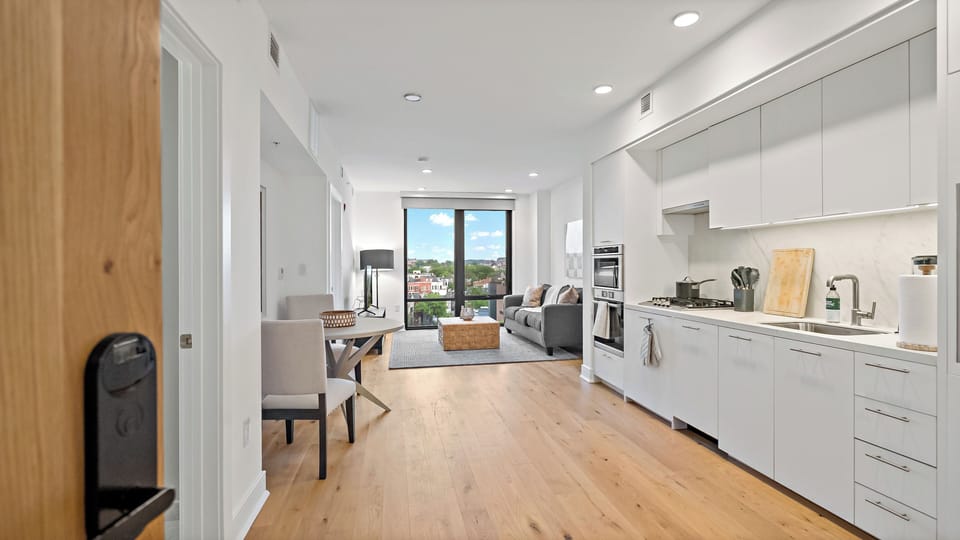 Panoramic Apartment, 1 Queen Bed, Kitchen, City View | Living area | 65-inch TV with digital channels, Netflix, Hulu