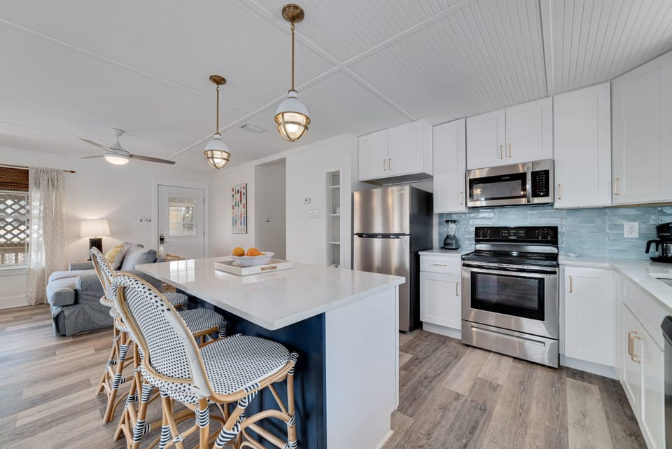 Kitchen with island bar seating for 3