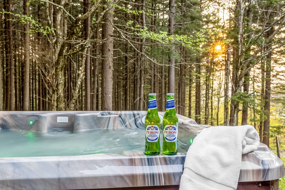 Relax and rejuvenate in our private hot tub while enjoying the sunset