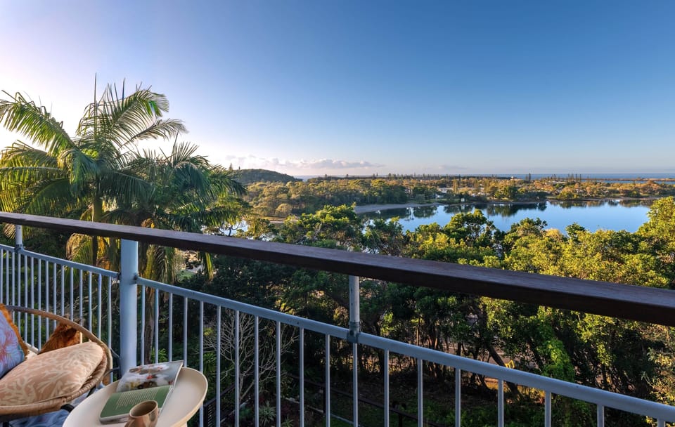 Soak up the morning sun on your private balcony with sweeping bay and ocean views stretching to the 