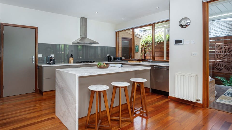 Kitchen with breakfast bar with seating for 4