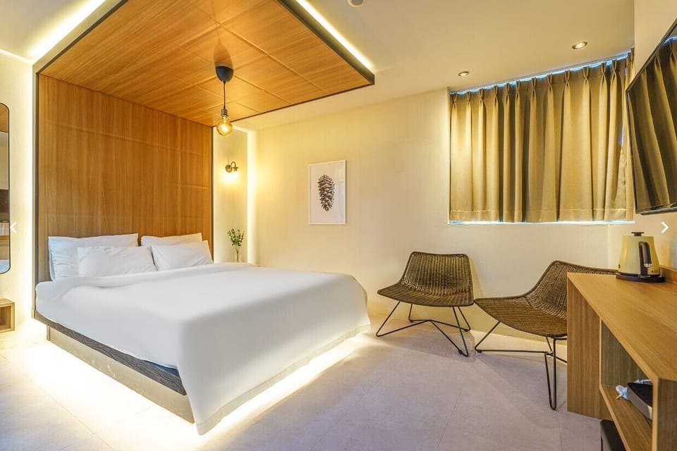 Family Triple Room | Free minibar, desk, free WiFi, bed sheets