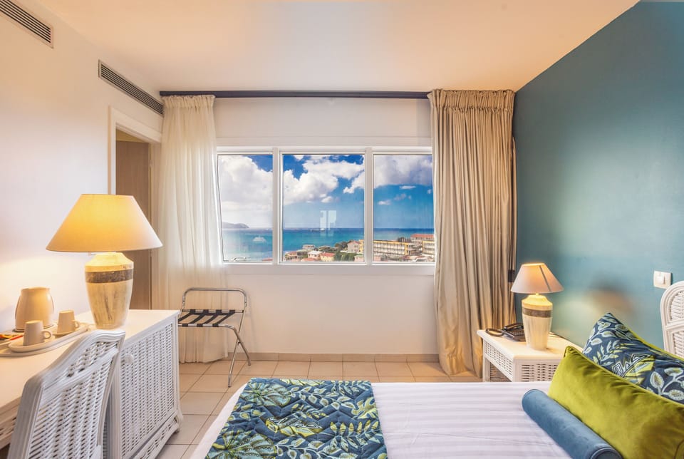 Superior Room, Sea View (Elevator) | In-room safe, desk, laptop workspace, blackout drapes