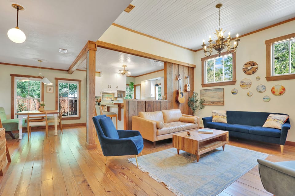 Living room is attached to dining room and kitchen