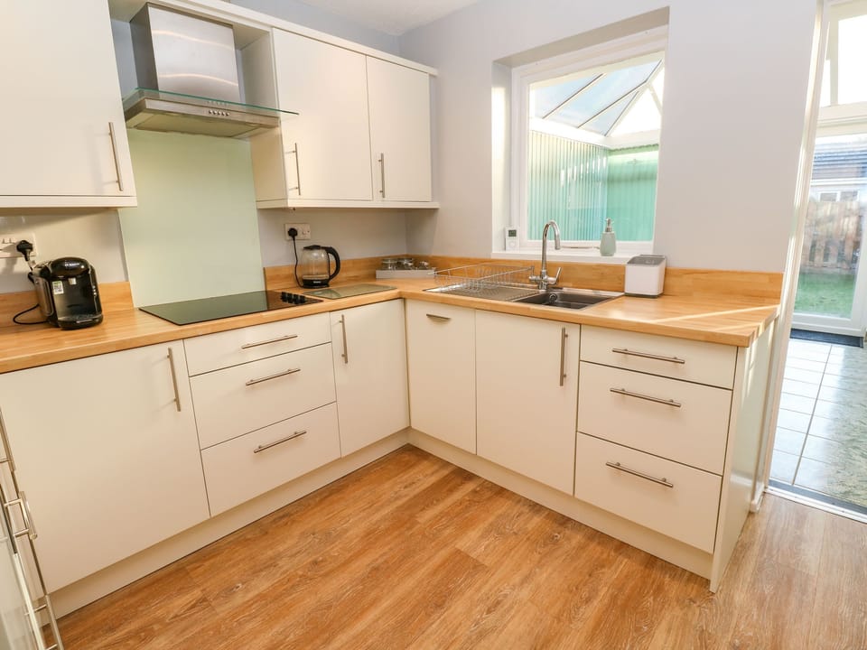 Fridge, electric kettle, toaster, cookware/dishes/utensils