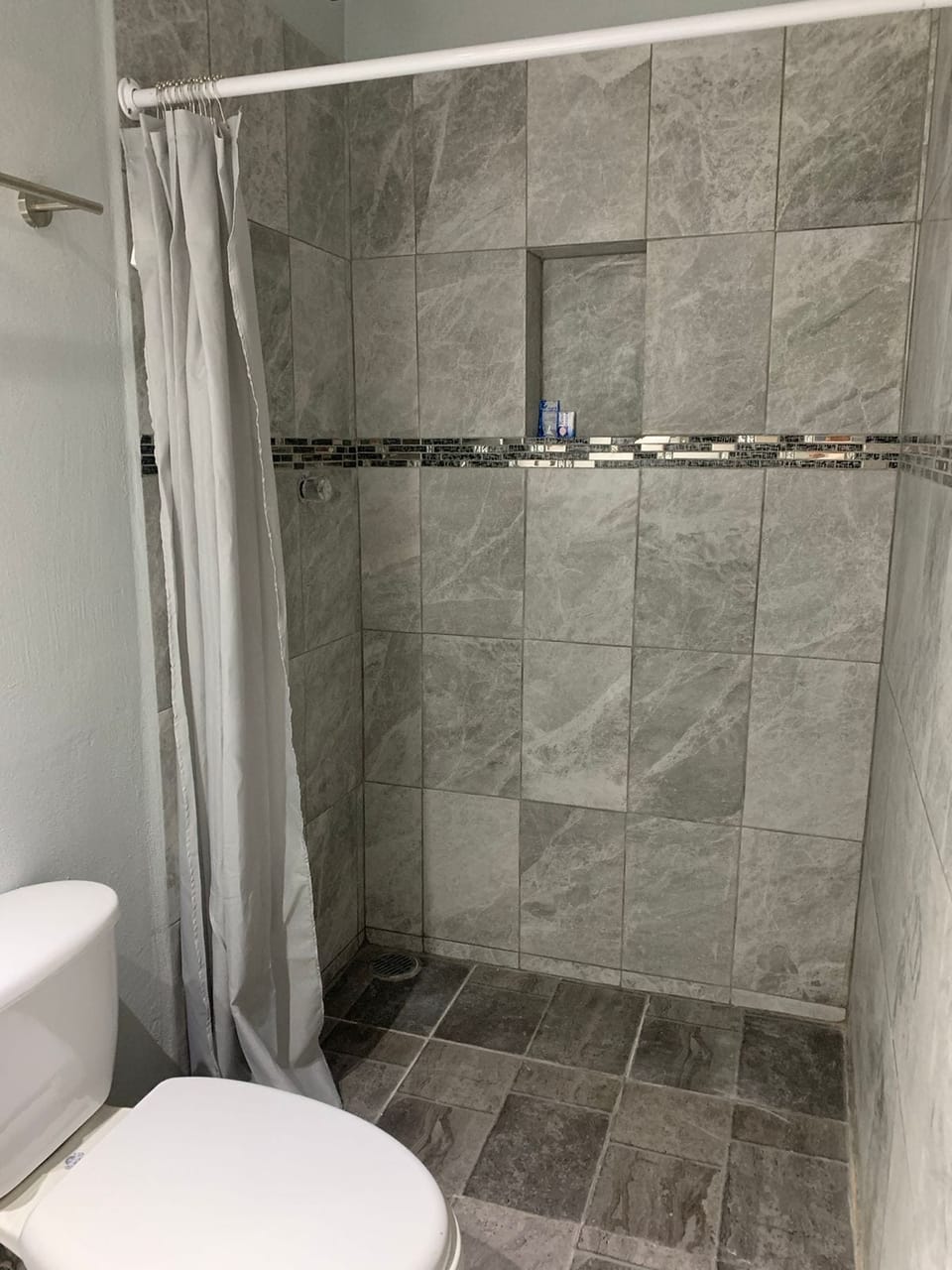 Shower, free toiletries, towels, soap