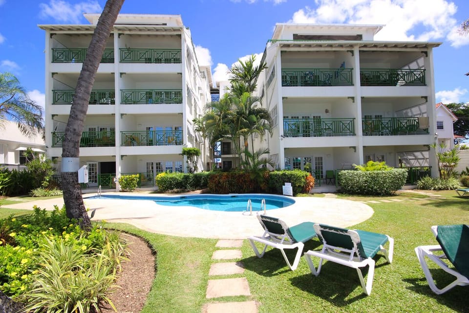View back of the pool and the apartments from the beach gate