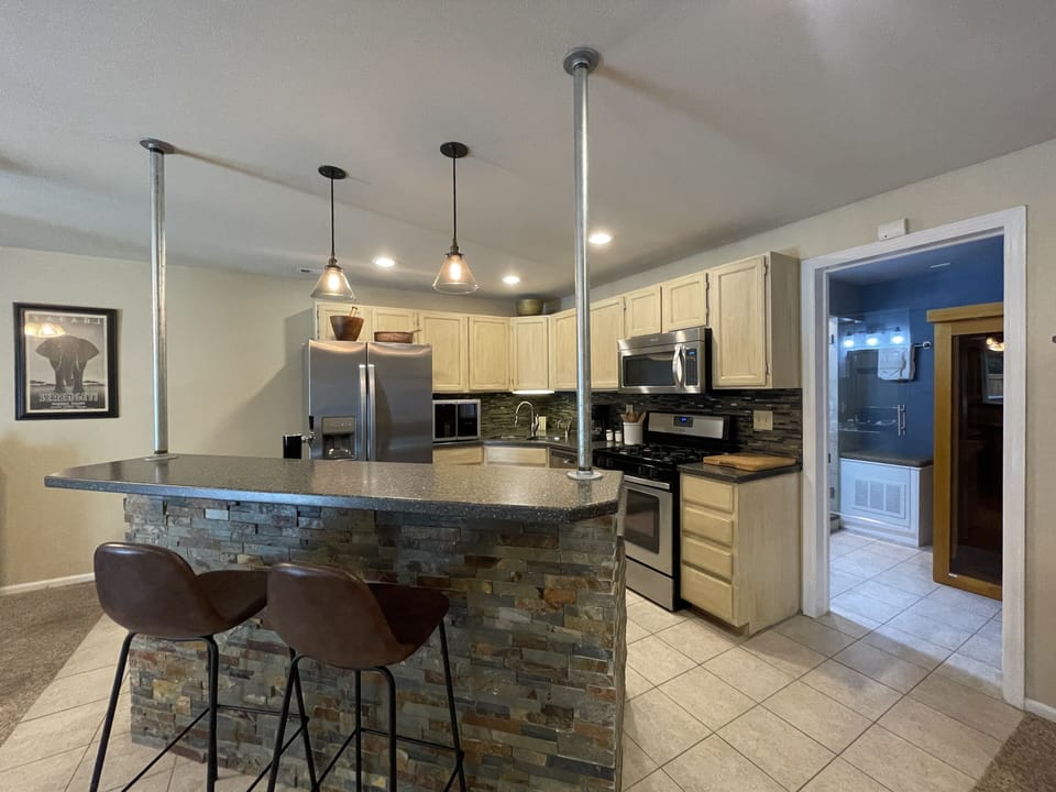 Apartment, 1 King Bed, Hot Tub, Garden View (579 Spindrift Ct Unit B) | Private kitchen | Fridge, microwave, oven, stovetop