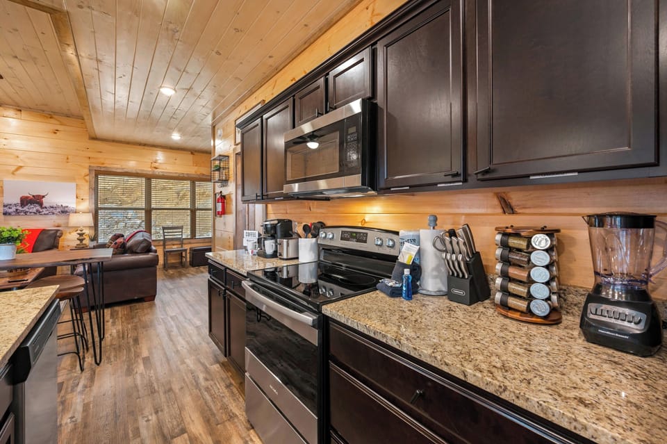 Enjoy all the comforts of a cozy cabin kitchen - perfect for homecooked dinners with family and friends.