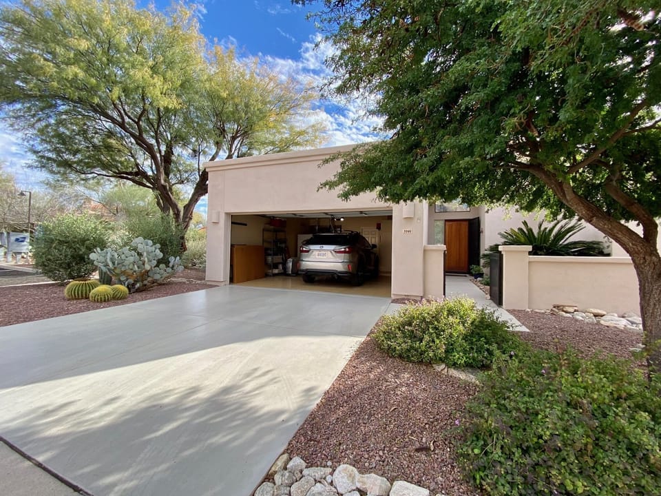 Front of the house with the 2 car garage.