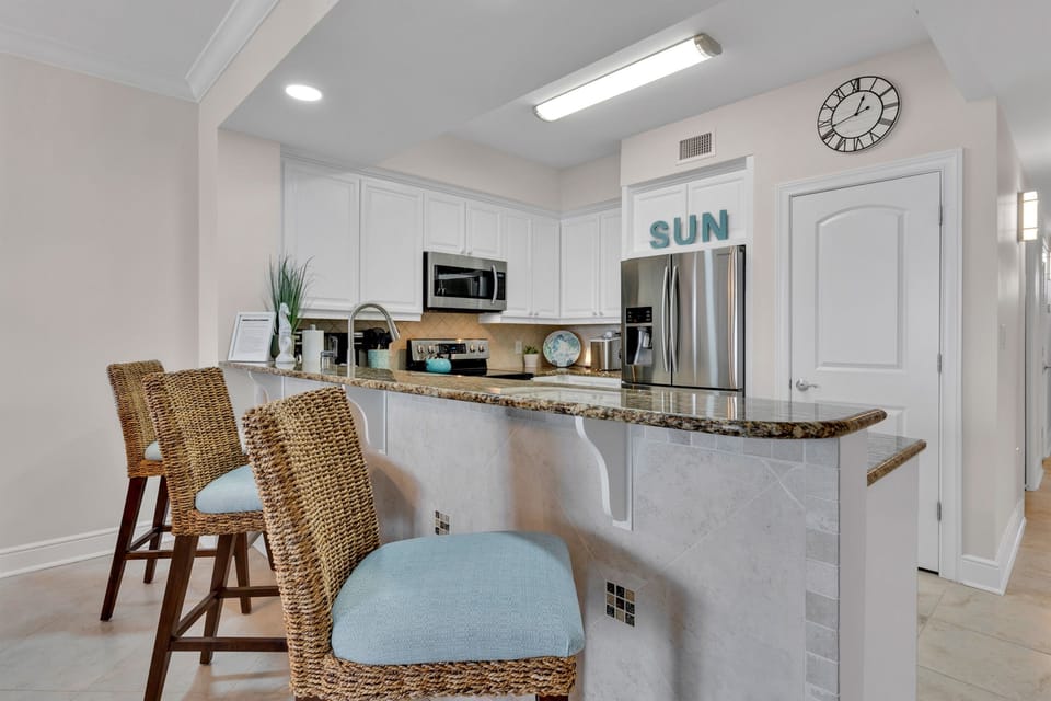 3 bar stools at breakfast bar
