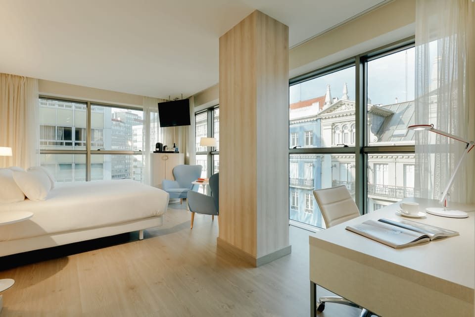 Junior Suite, Terrace | Minibar, in-room safe, individually furnished, desk