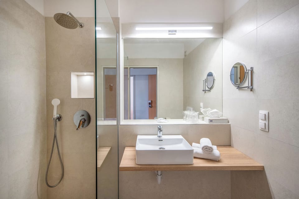 Hair dryer, towels, soap, shampoo