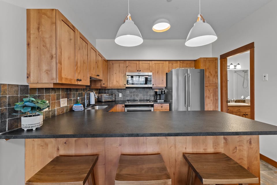 Counter seating and new updated light fixtures w/dimmers