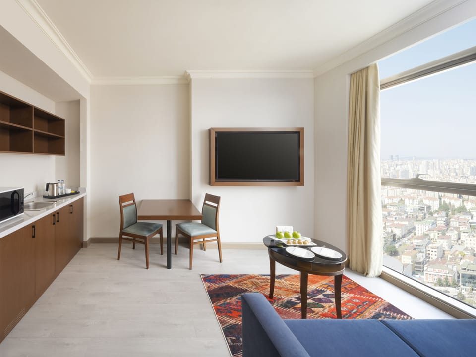 Suite, Multiple Beds | Minibar, laptop workspace, blackout drapes, soundproofing
