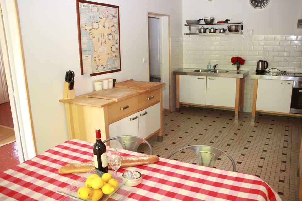 The kitchen is well equipped and has one of the many dining areas.