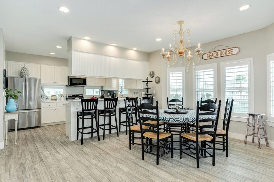 Nearby breakfast bar offers seating for 4